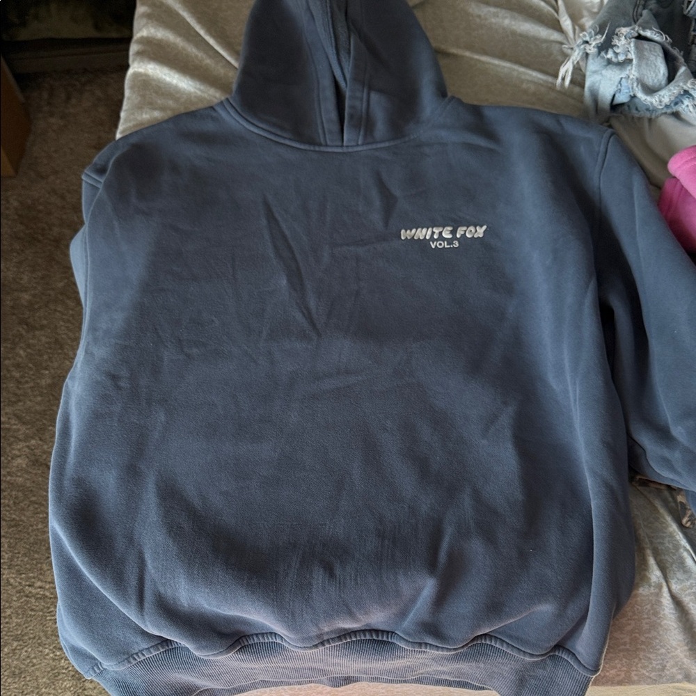 Woman’s white fox Blue Hoodie